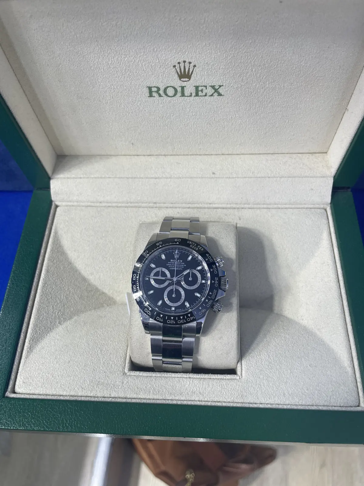 Rolex Daytona in its box at Roma Jewelry.