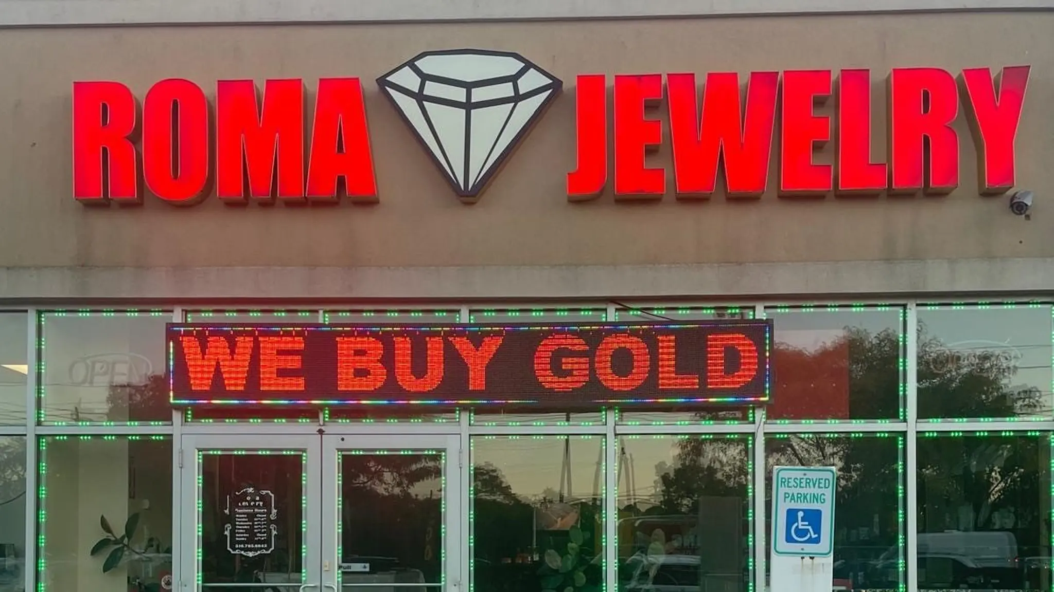 Roma Jewelry storefront on Sunrise Highway, Massapequa, with the red We Buy Gold sign.