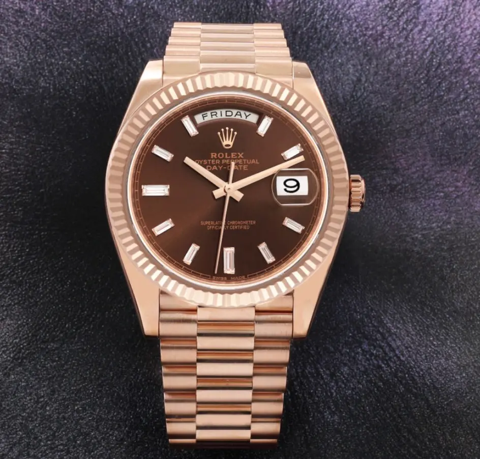 Rose gold Rolex Day-Date President with a chocolate diamond-set dial.