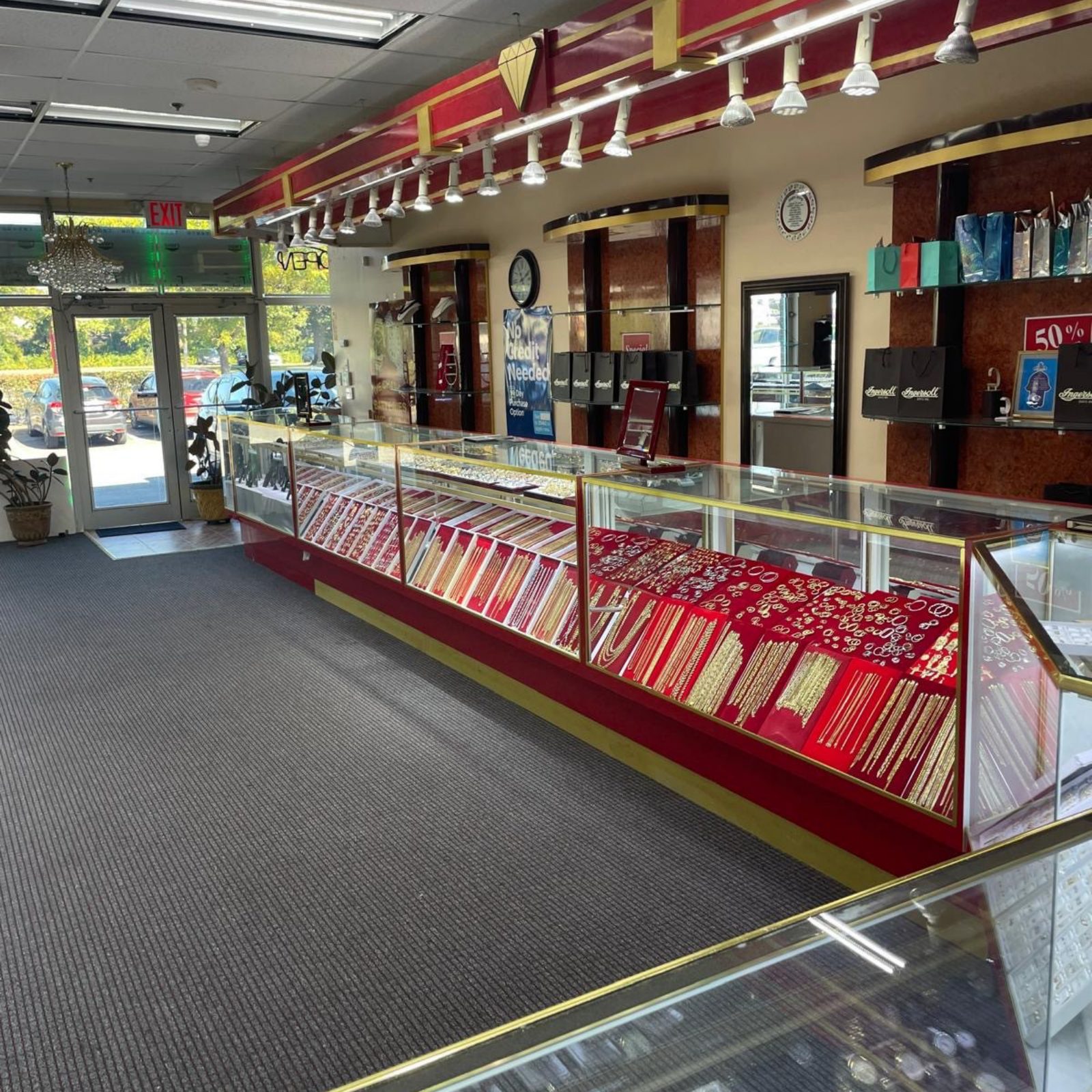 Display cases of rings and gold jewelry inside the Roma Jewelry showroom in Massapequa.